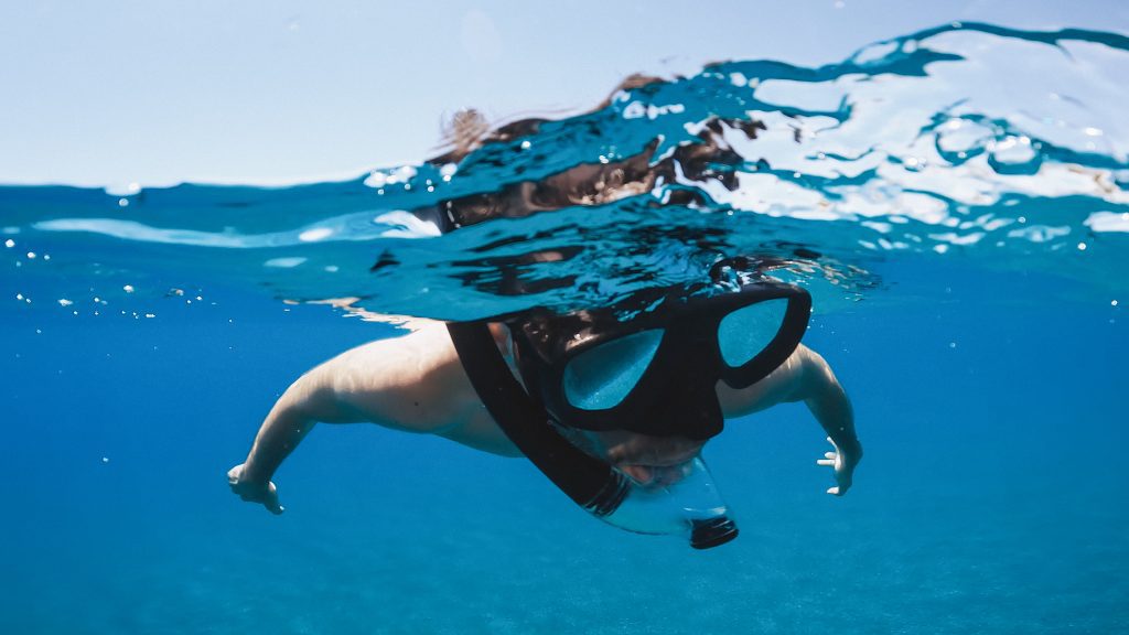 Snorkeling and free diving underwater.